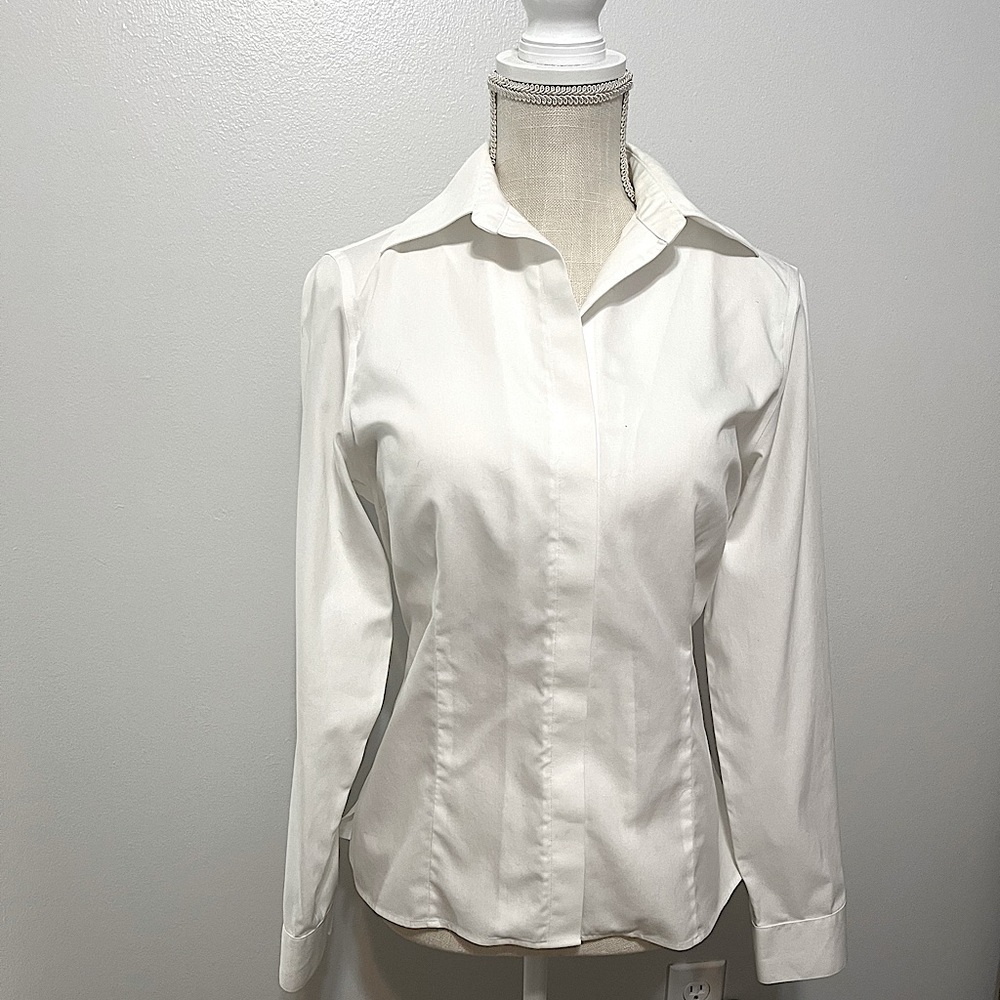 Classic white blouse, no iron tailored with princess seams, fitted. Placket